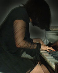 IRIS GILLON PLAYING PIANO